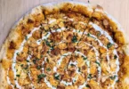butter chicken pizza recipe creamy curry, mozzarella, and naan crust in under 30 minutes. Try this flavorful twist today!