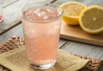 Glass of water with dissolved Himalayan salt for hydration in Himalayan salt diet