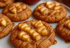 Homemade Caramel Apple Cookies Recipes stacked with cinnamon and caramel sauce, ready to enjoy.
