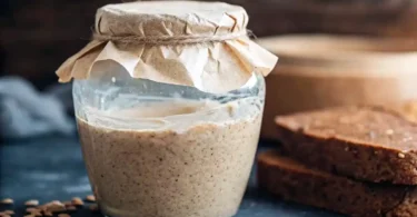 Glass jar filled with fermenting Natural Yeast water mixture