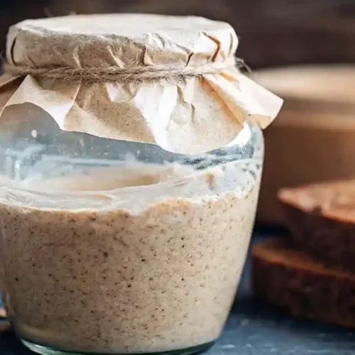 Glass jar filled with fermenting Natural Yeast water mixture