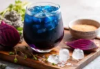 Ingredients for the Horse Salt Recipe for Men with blue salt, water, lemon, and optional mint