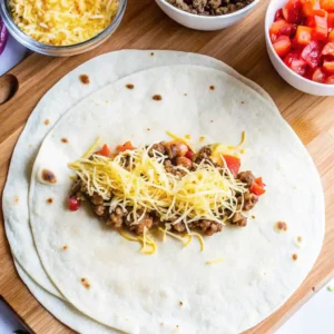 Easy Taco Bell Meximelt Recipe served warm with beef, cheese, and fresh toppings