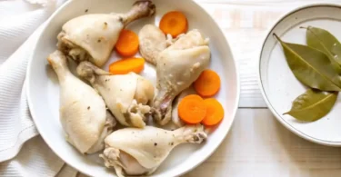 Step-by-step view showing how to boil chicken thighs perfectly in a pot of simmering broth.