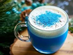 A glass of indigo-colored drink made from The Persian Blue Salt Trick Recipe, glowing under soft kitchen light.